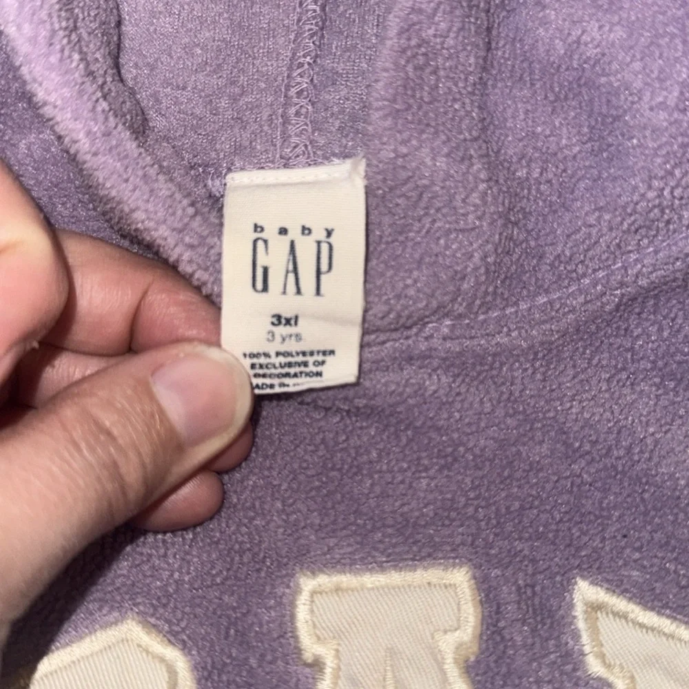Gap size 3 years girls, purple with white gap little tears on cuff of the sleave